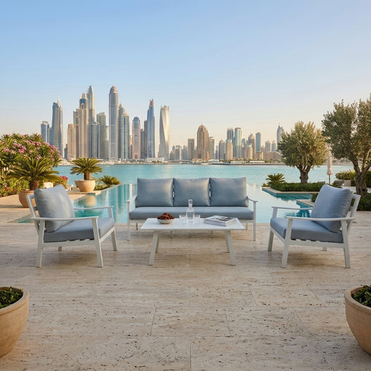 Outdoor sofa set with white aluminum frames and light blue seat cushions