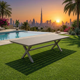 Rectangular aluminum outdoor dining table with light gray slatted top and X-frame legs