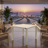 White aluminum outdoor dining table with slatted tabletop and square legs